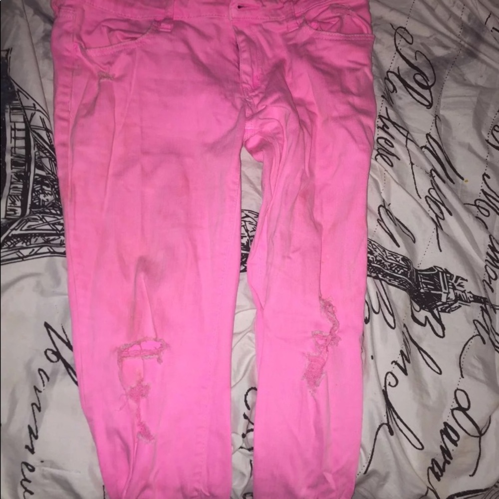 Pink ripped jeans